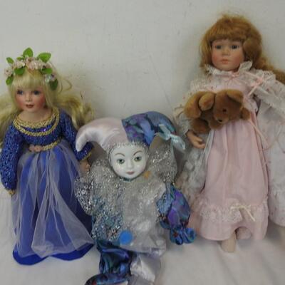 4 Dolls Porcelain Dolls, 1 Clown and 3 Ladies