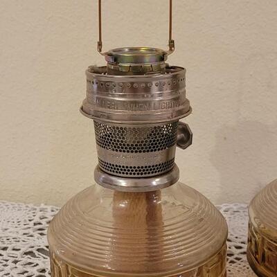 Lot 191: (2) Aladdin Glass Kerosene Lamps