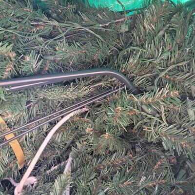 Lot 204: Pre-lite 7 or 8 Ft. Christmas Tree with Stand in Storage Bag