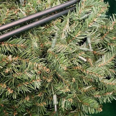 Lot 204: Pre-lite 7 or 8 Ft. Christmas Tree with Stand in Storage Bag