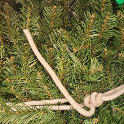 Lot 204: Pre-lite 7 or 8 Ft. Christmas Tree with Stand in Storage Bag