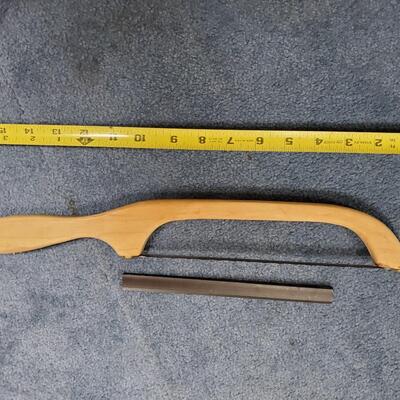 Wood handle bread saw