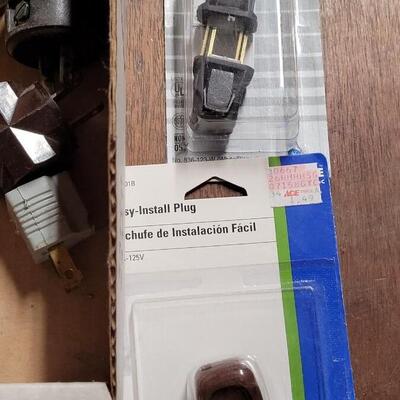 Lot 247: Door Stops and Electrical Plugs