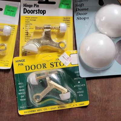 Lot 247: Door Stops and Electrical Plugs