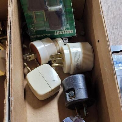 Lot 247: Door Stops and Electrical Plugs