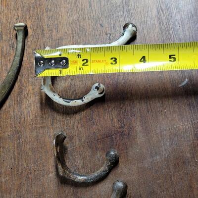 Lot 252: Vintage Brass Hooks Lot