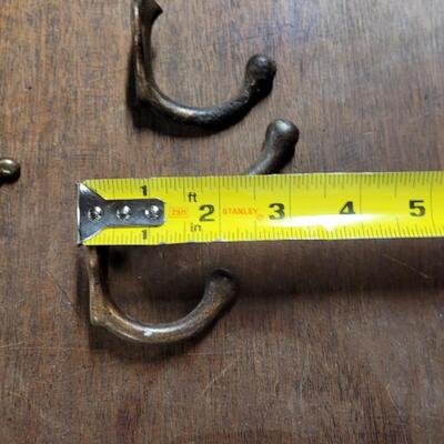 Lot 252: Vintage Brass Hooks Lot