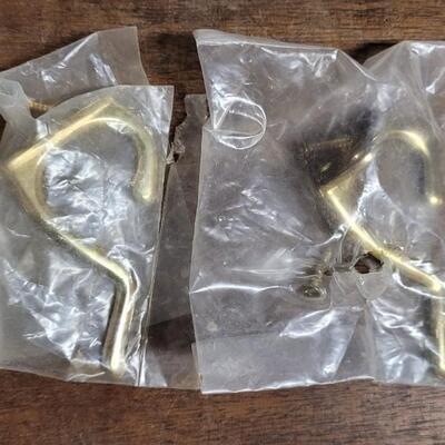 Lot 254: Vintage Brass Hooks Lot