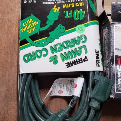 Lot 262: Lawn & Garden 40 ft. Extension Cord and Universal Security System