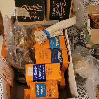 Lot 273: Large Lot of Kerosene Lamp Chimneys, Wicks and Other Parts