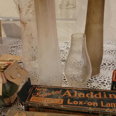 Lot 273: Large Lot of Kerosene Lamp Chimneys, Wicks and Other Parts