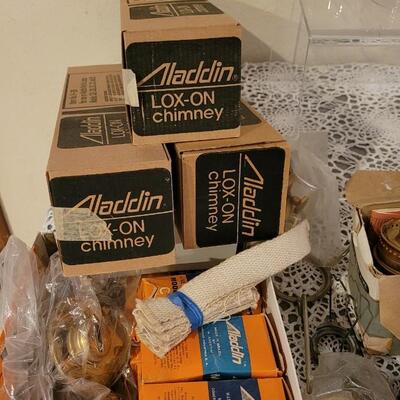 Lot 273: Large Lot of Kerosene Lamp Chimneys, Wicks and Other Parts