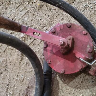 Lot 321: Vintage Farm Hand Crank FILL RITE Series 100 Pump w/ Original Hose Remnant