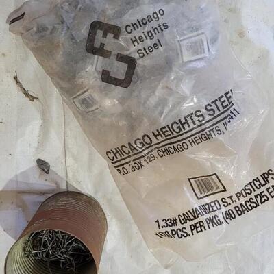 Lot 333: Assortment of Used and New T Post Fastener Hardware