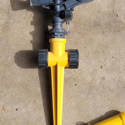 Lot 352: Yellow Plastic Sprinkler, (3) Sprayers and a 2 Way Connection