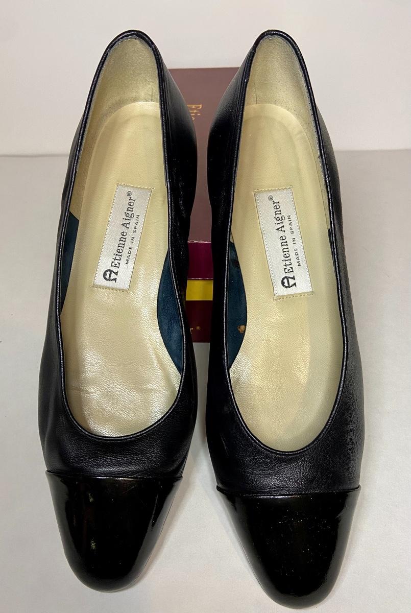 etienne aigner flats