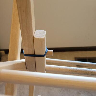 Lot 379: Wood Folding Rack- uses rubber bands to clamp