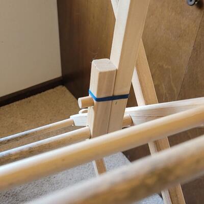 Lot 379: Wood Folding Rack- uses rubber bands to clamp