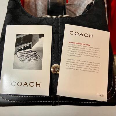Lot 085: Black Signature C Coach Handbag