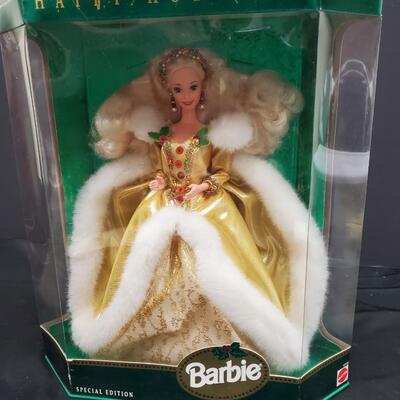 6 Holiday Barbies in original boxes