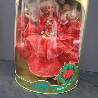 6 Holiday Barbies in original boxes