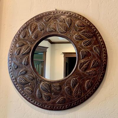 Round metal wall mirror