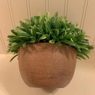 Faux plant with pottery vase