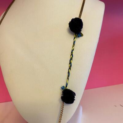 Long Necklace with Beads and Black Pom Pots