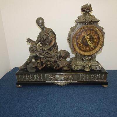LOT 11. Antique Ansonia Cincinnatus Figural Cast Metal Mantle Clock