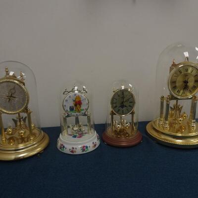 LOT 12  Four Anniversary Clocks not tested