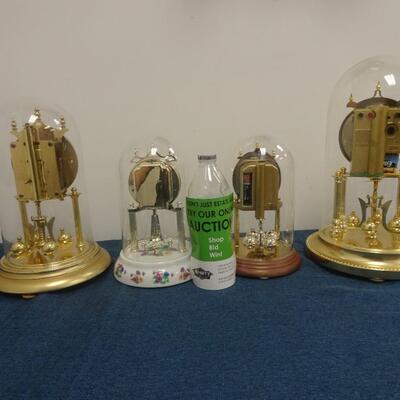 LOT 12  Four Anniversary Clocks not tested