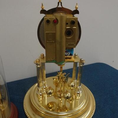 LOT 12  Four Anniversary Clocks not tested