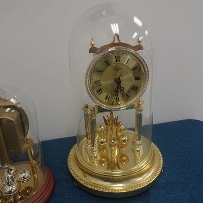 LOT 12  Four Anniversary Clocks not tested