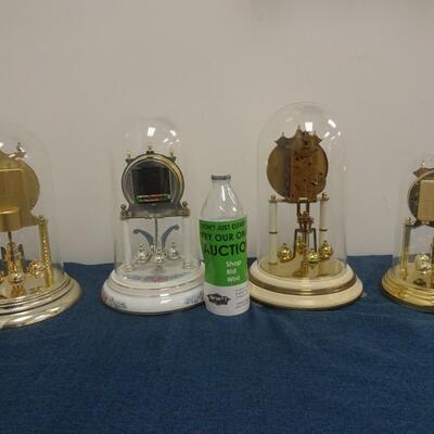 LOT 13. Four Anniversary Clocks not tested