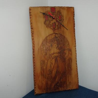 LOT 15. Vintage carved wood clock