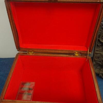 LOT 22. WOOD CARVED BOX AND CAST IRON