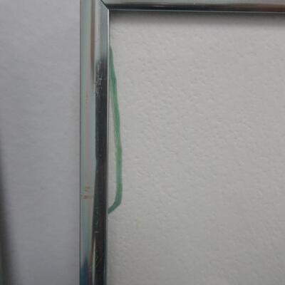 LOT 24. TWO FRAMED PRINTS