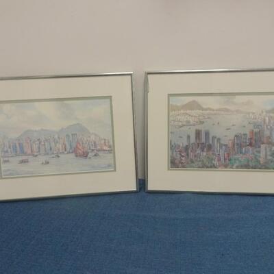LOT 24. TWO FRAMED PRINTS