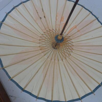 LOT 31  PORCELAIN UMBRELLA STAND AND UMBRELLA