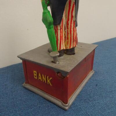 LOT 44. VINTAGE CAST IRON BANK UNCLE SAM