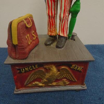 LOT 44. VINTAGE CAST IRON BANK UNCLE SAM
