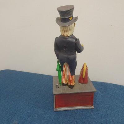 LOT 44. VINTAGE CAST IRON BANK UNCLE SAM