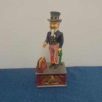 LOT 44. VINTAGE CAST IRON BANK UNCLE SAM