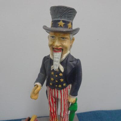 LOT 44. VINTAGE CAST IRON BANK UNCLE SAM