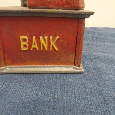 LOT 44. VINTAGE CAST IRON BANK UNCLE SAM