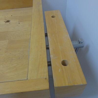 LOT 49. WHITE GATE WOODWORKING WORK BENCH WITH TWO WOOD VISES