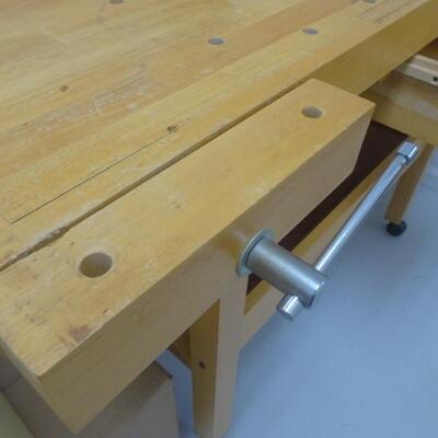 LOT 49. WHITE GATE WOODWORKING WORK BENCH WITH TWO WOOD VISES
