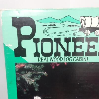 LOT 90. VINTAGE  PIONEER WOOD CRAFT TOY LOG CABIN SET