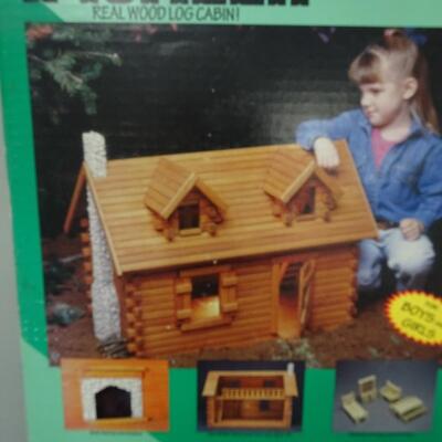 LOT 90. VINTAGE  PIONEER WOOD CRAFT TOY LOG CABIN SET