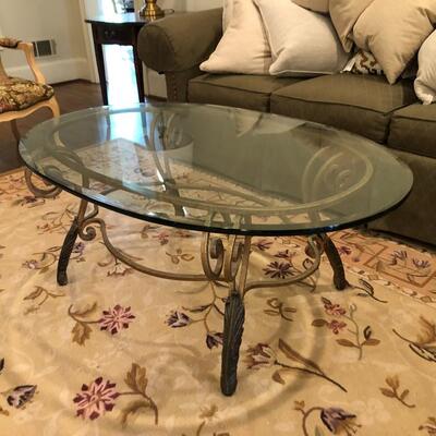 Wrought Iron Coffee Table with Oval Glass Top - Item Must be Scheduled for Pickup.